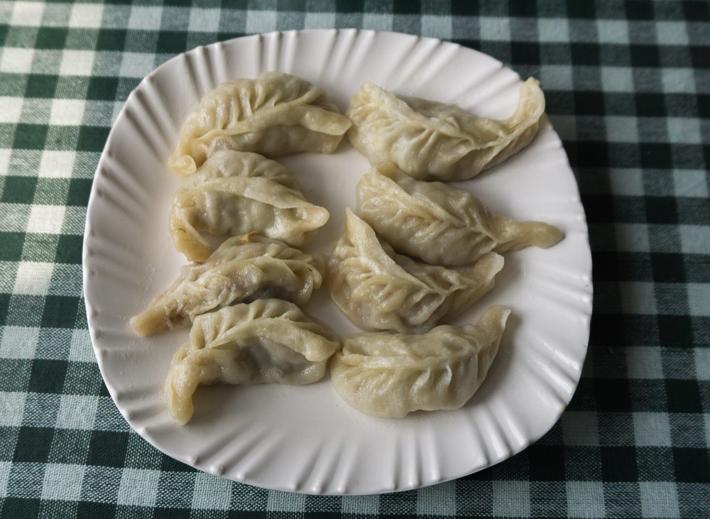 Steamed momos with a smooth wrapper